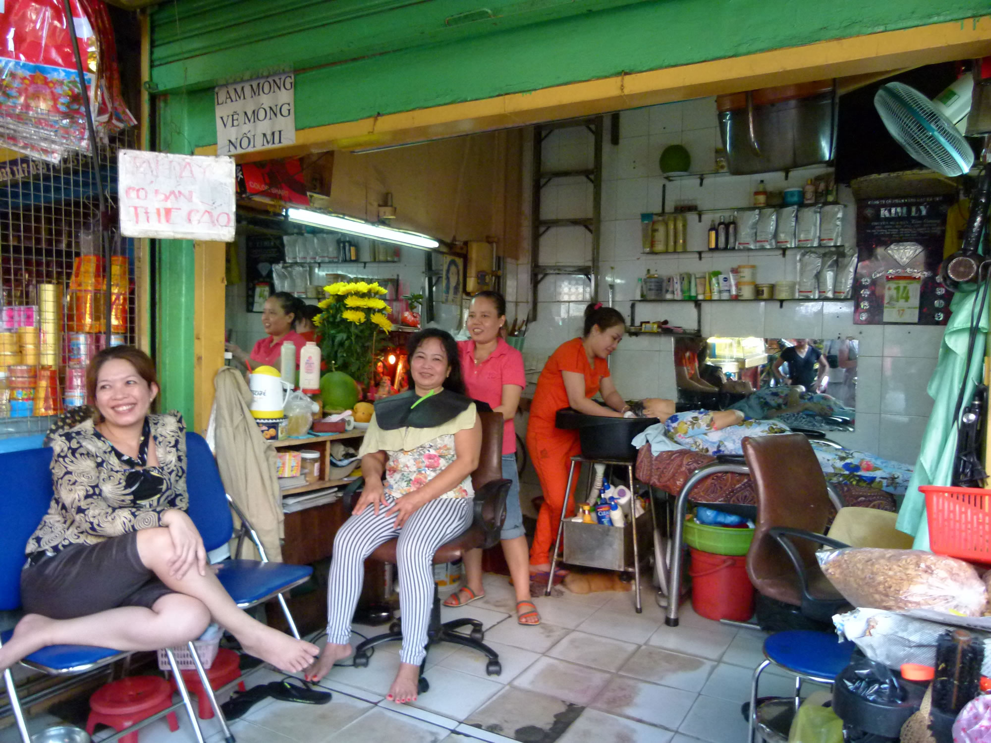 Hairdresser happiness, South Vietnam. Sandra File